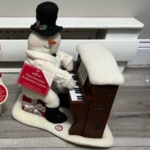 Snowman playing piano Hallmark
